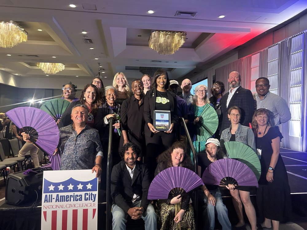 AAC delegates celebrating win in Denver